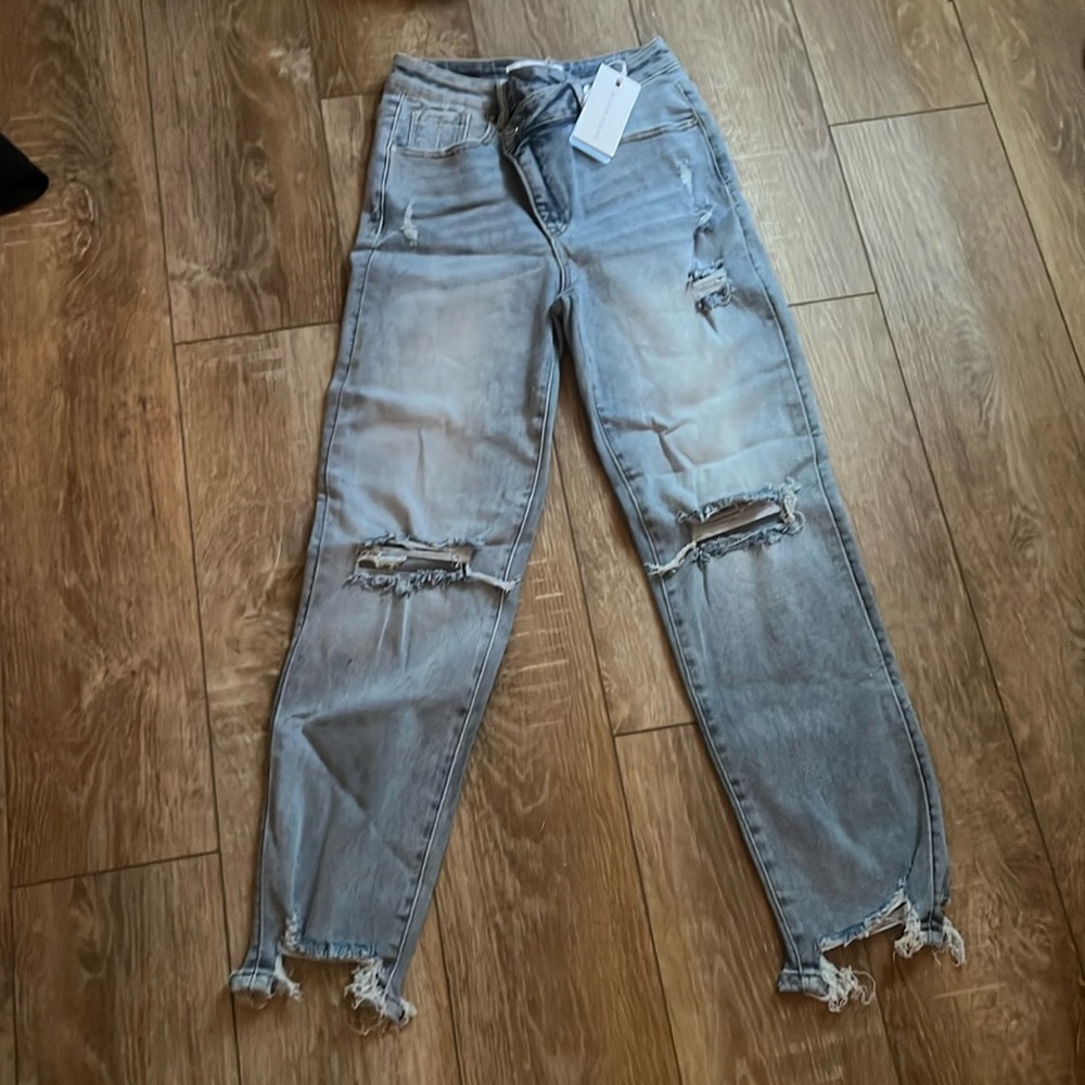 COPY - Crossover distressed girlfriend jeans.